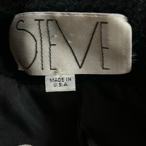 Black long coat dry cleaning only. Size 10